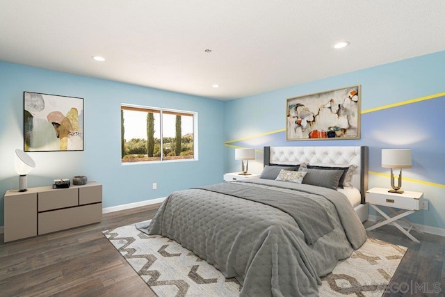 bedroom featuring dark wood-type flooring