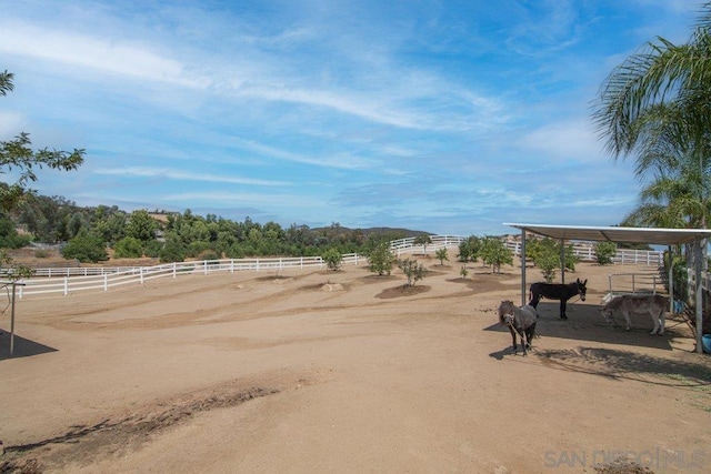 exterior space with a rural view