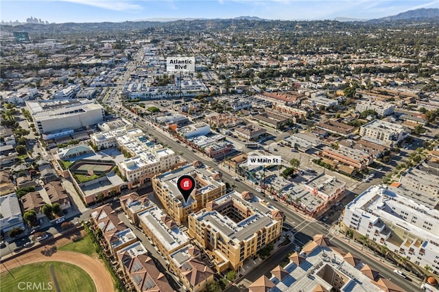 birds eye view of property featuring a mountain view