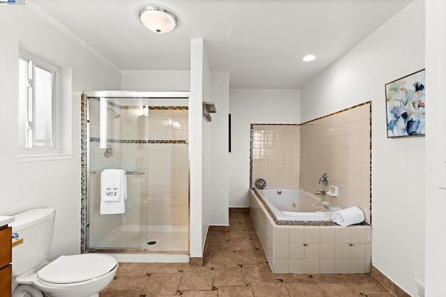 bathroom featuring toilet and shower with separate bathtub