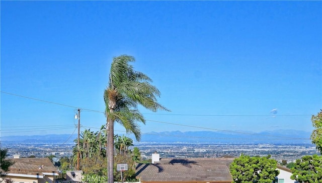 exterior space featuring a mountain view