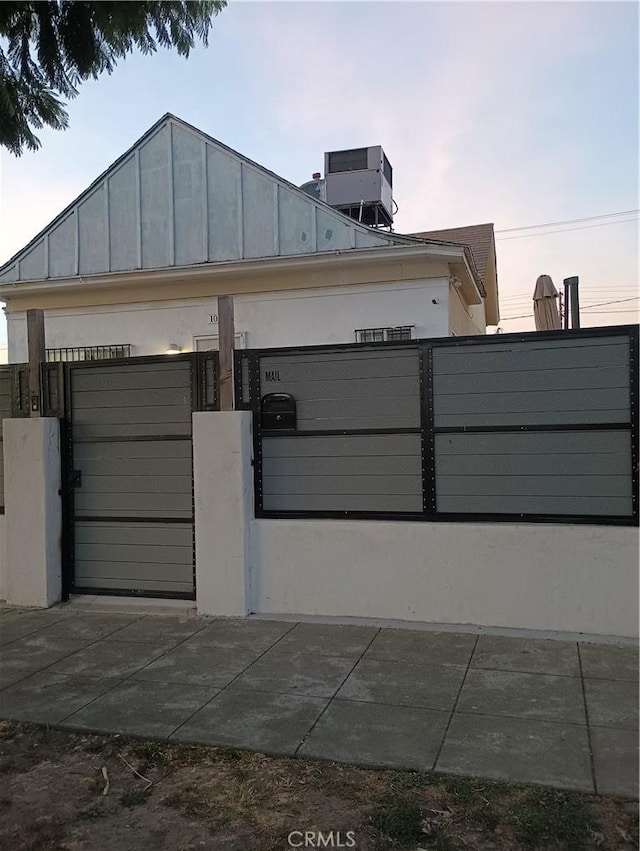 exterior space featuring central AC unit