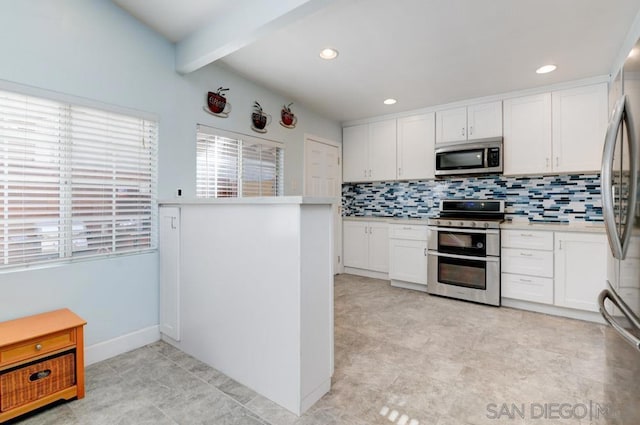 kitchen featuring beam ceiling, decorative backsplash, appliances with stainless steel finishes, and white cabinetry