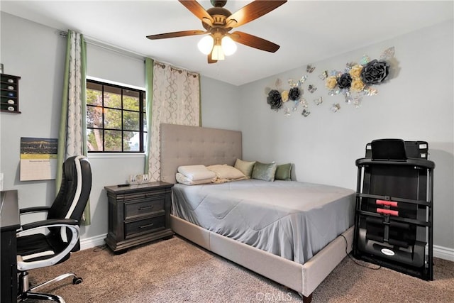 bedroom with ceiling fan and light carpet