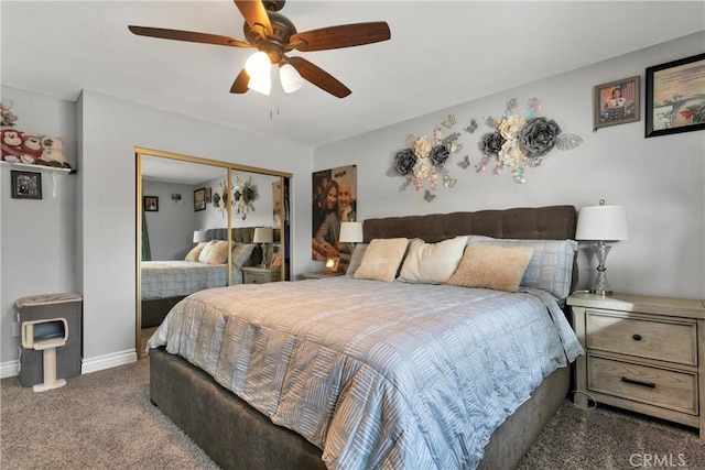 carpeted bedroom featuring ceiling fan and a closet