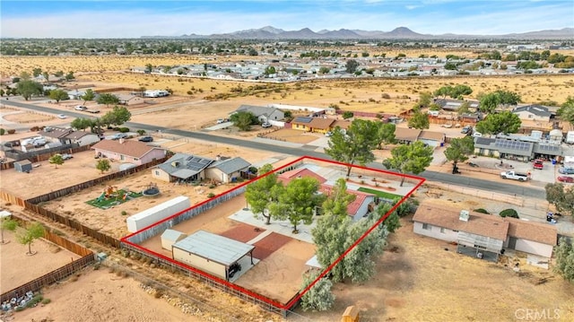 drone / aerial view featuring a mountain view