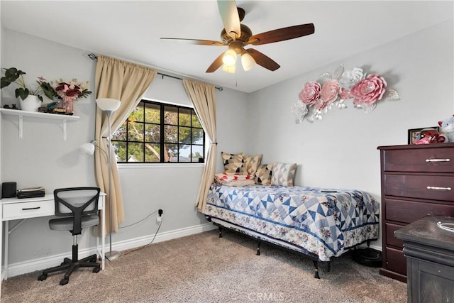 bedroom featuring ceiling fan and carpet