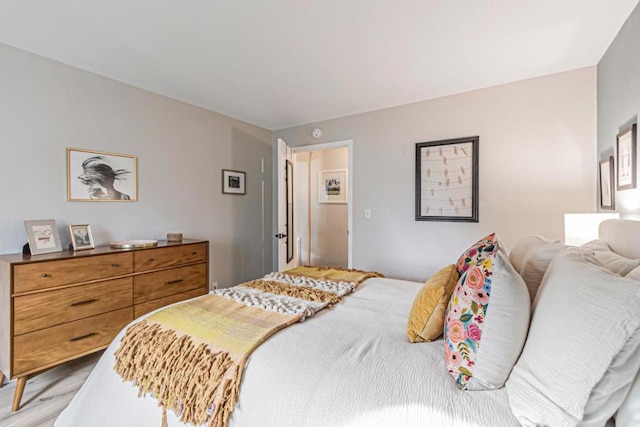 bedroom with light hardwood / wood-style flooring