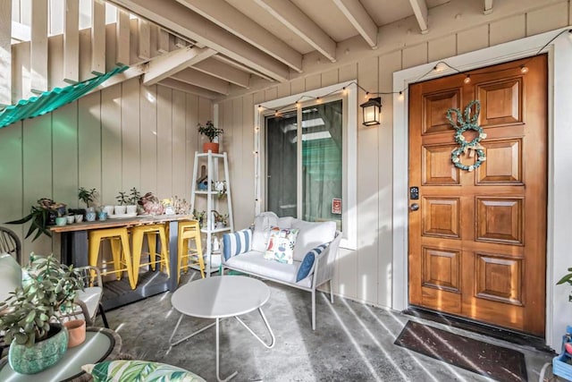 doorway to property with a porch