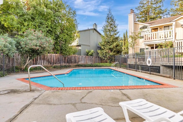 view of pool with a patio area