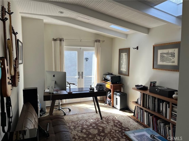 home office with french doors and vaulted ceiling with beams