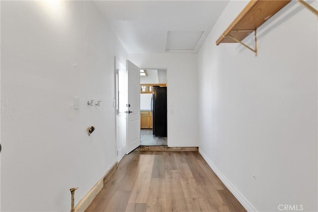 corridor featuring light wood-type flooring