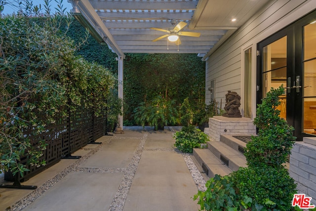 view of patio / terrace featuring ceiling fan