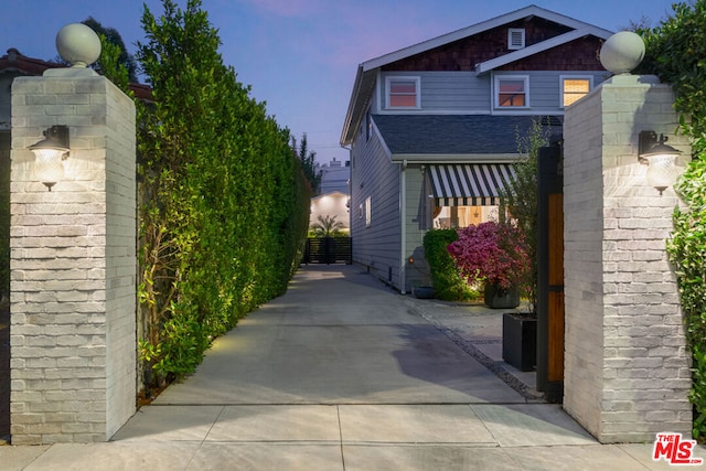 view of property exterior at dusk