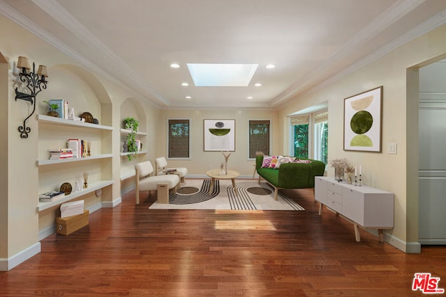 living area with built in shelves, crown molding, dark wood-type flooring, and a skylight