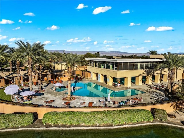 view of pool with a mountain view