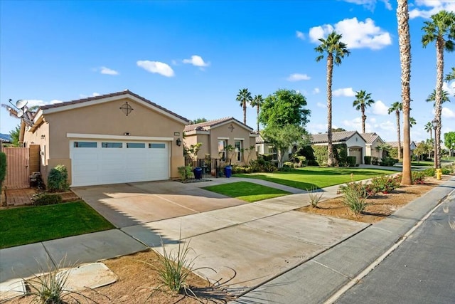 view of front of house with a front lawn and a garage