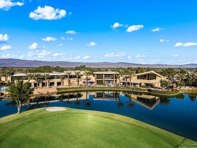 view of property's community with a water and mountain view