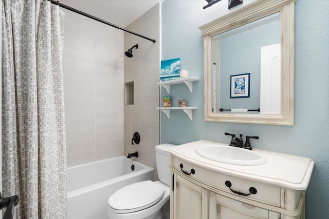 full bathroom with vanity, shower / tub combo, and toilet