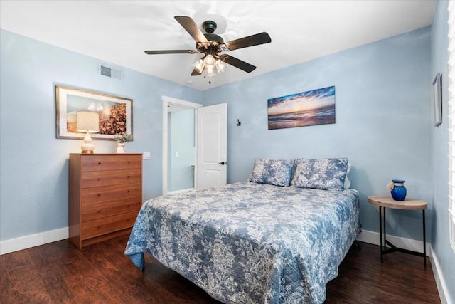 bedroom featuring ceiling fan and dark wood-type flooring