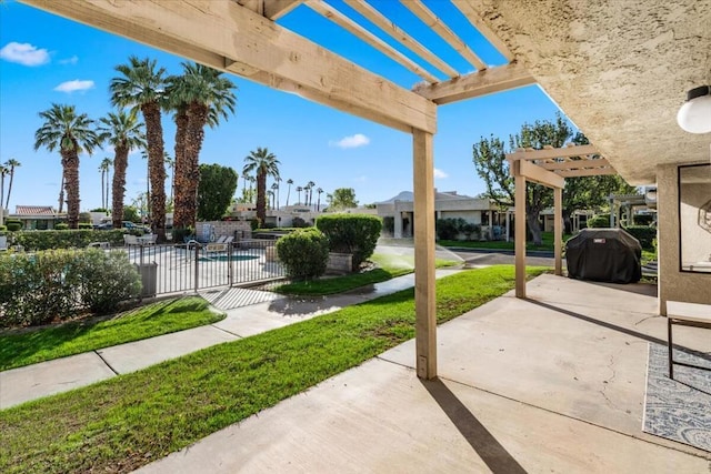 view of patio featuring a pergola, area for grilling, and a community pool