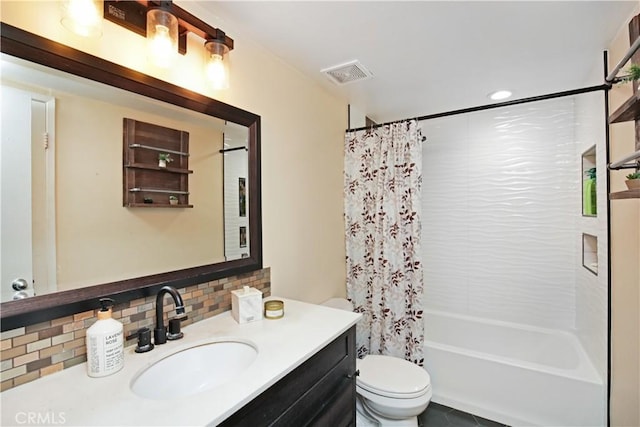 full bathroom featuring toilet, tasteful backsplash, shower / bathtub combination with curtain, and vanity