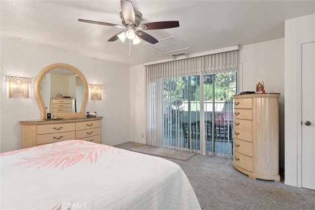 carpeted bedroom featuring access to outside and ceiling fan