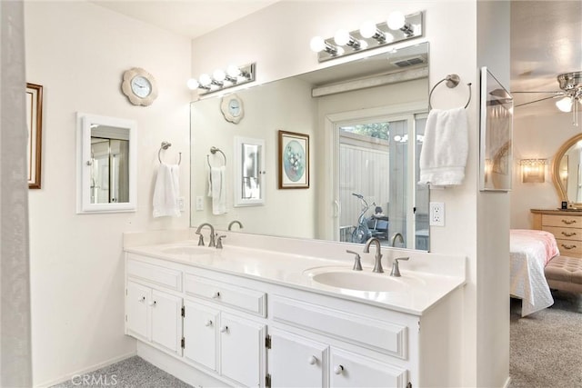 bathroom featuring vanity and ceiling fan