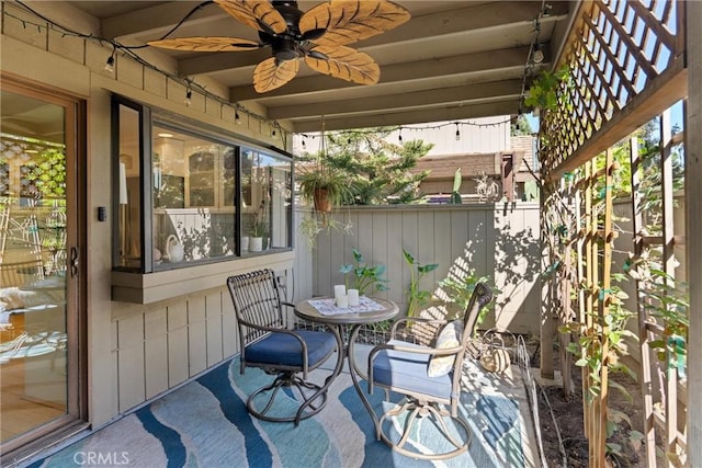 view of patio featuring ceiling fan