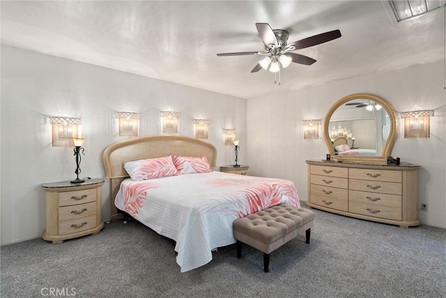 bedroom with ceiling fan and carpet floors