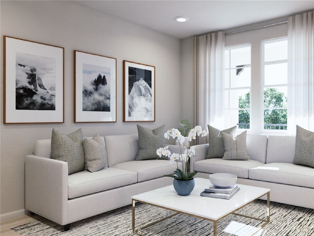 living room featuring light hardwood / wood-style floors and plenty of natural light