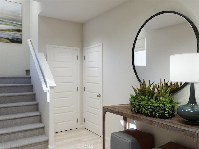 staircase featuring hardwood / wood-style floors