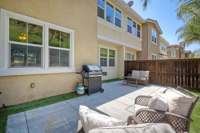 view of patio featuring an outdoor living space and grilling area