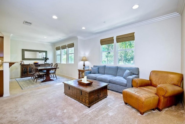 carpeted living room with ornamental molding