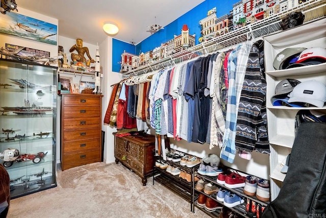 spacious closet with carpet flooring