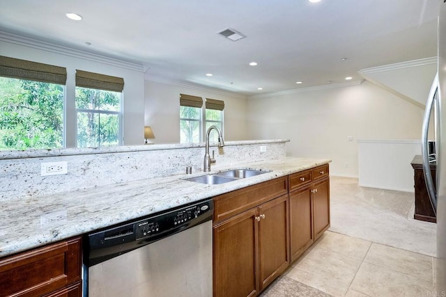 kitchen featuring light carpet, light stone counters, stainless steel appliances, crown molding, and sink