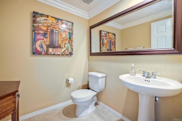 bathroom featuring tile patterned flooring, sink, toilet, and crown molding