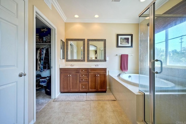 bathroom with shower with separate bathtub, vanity, tile patterned floors, and ornamental molding