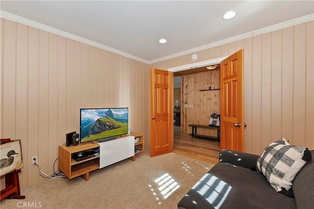 living room with carpet and ornamental molding