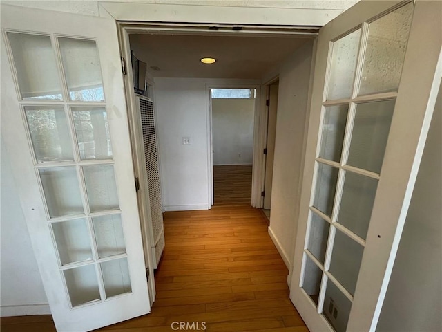 hallway featuring hardwood / wood-style floors