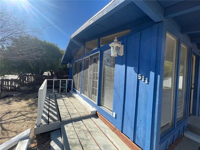 view of home's exterior featuring a deck