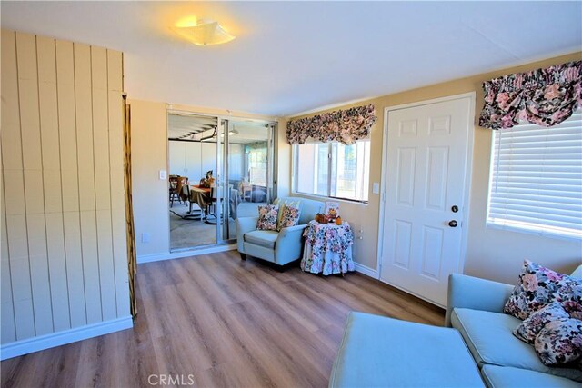 living room with light hardwood / wood-style floors