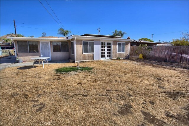 back of property with french doors