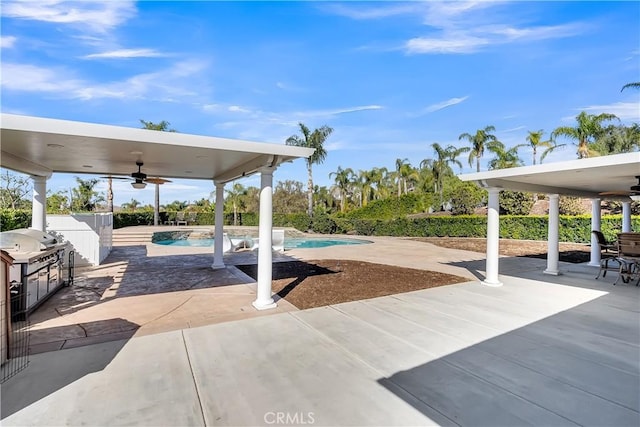 view of patio featuring grilling area and ceiling fan