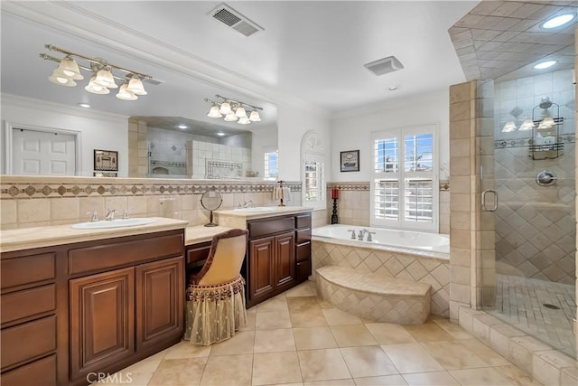 bathroom featuring tasteful backsplash, vanity, separate shower and tub, crown molding, and tile patterned flooring