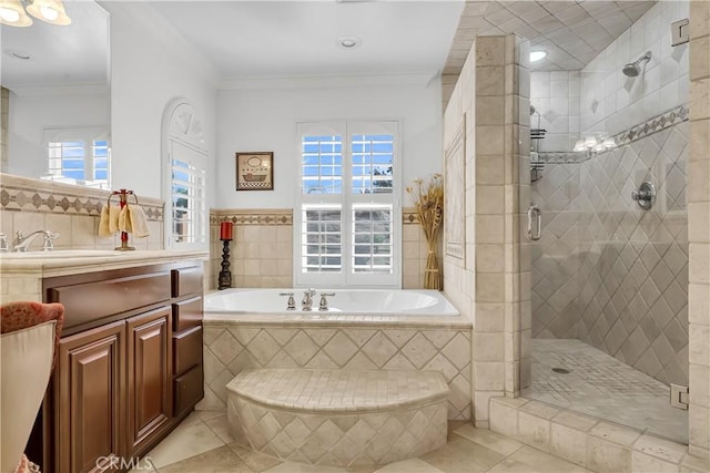 bathroom featuring independent shower and bath and ornamental molding