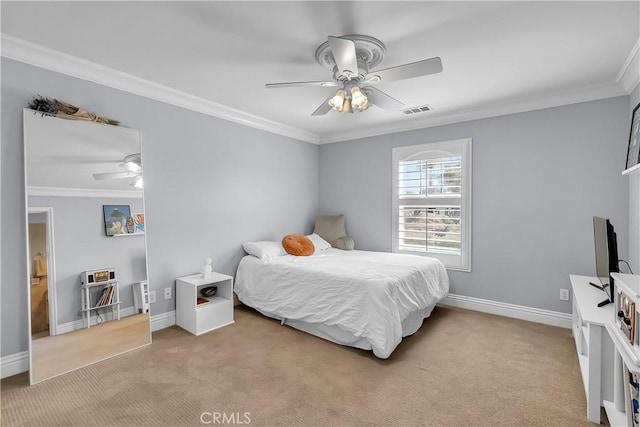 bedroom with ceiling fan, light colored carpet, and ornamental molding