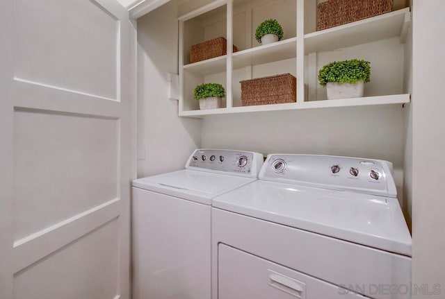 washroom featuring separate washer and dryer