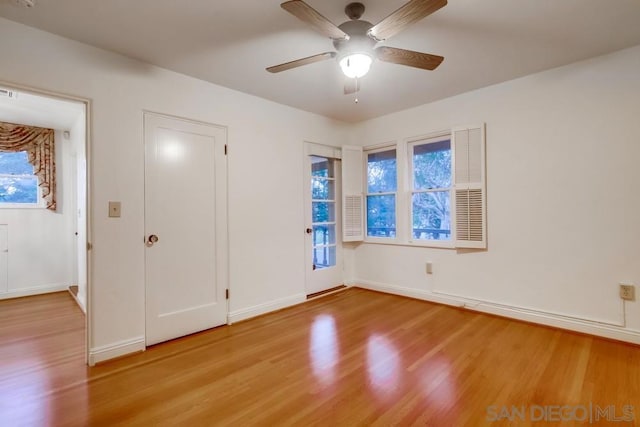 unfurnished bedroom featuring ceiling fan and hardwood / wood-style floors