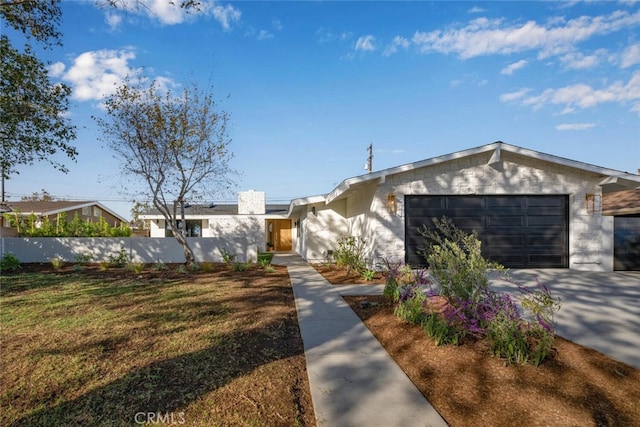 ranch-style home with a garage